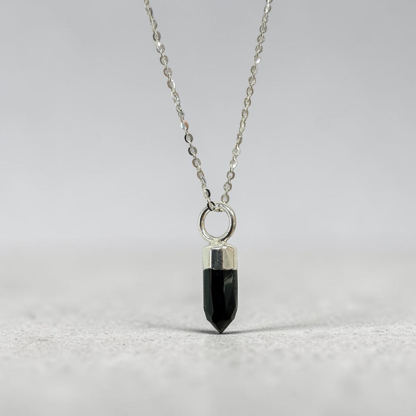 Black Tourmaline Faceted Point Pendant in Sterling Silver