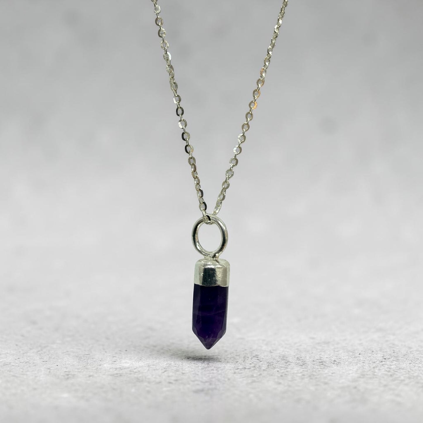 Amethyst Faceted Point Pendant in Sterling Silver